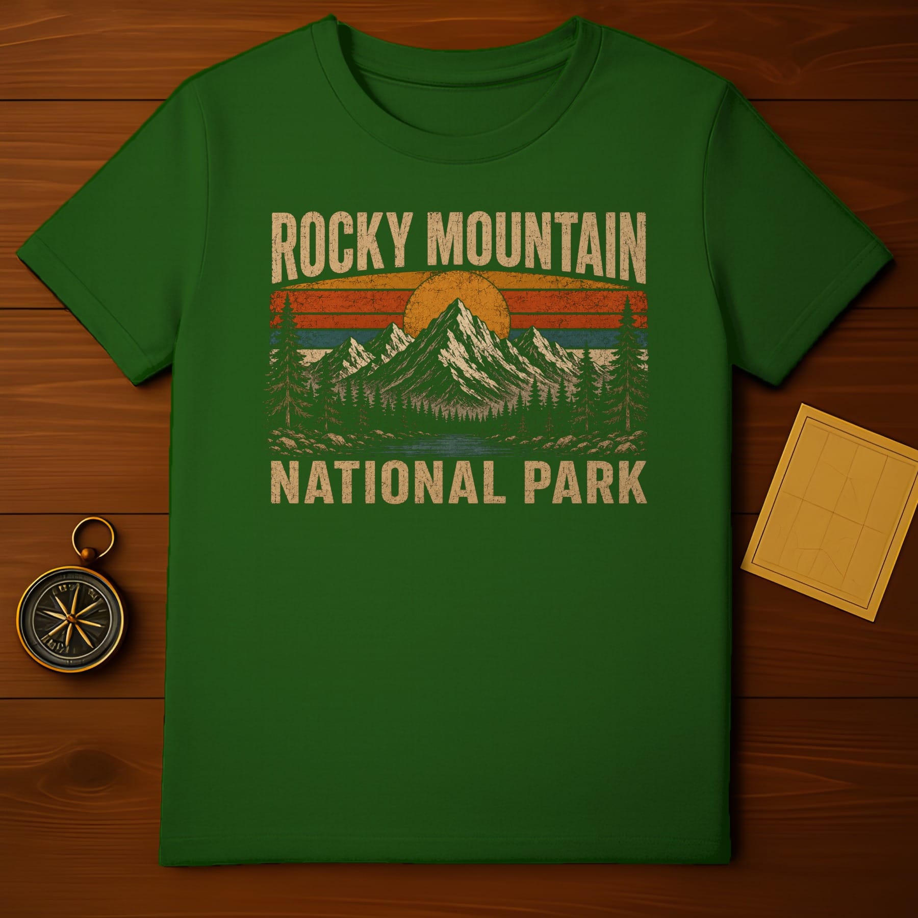 Green t-shirt with Rocky Mountain National Park graphic.