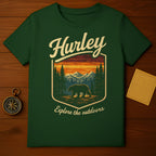 Green t-shirt with Hurley logo, bear in forest, and "Explore the outdoors" text.
