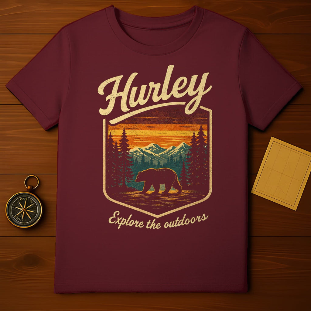 Maroon t-shirt with "Hurley Explore the outdoors" and a bear in a forest sunset scene.