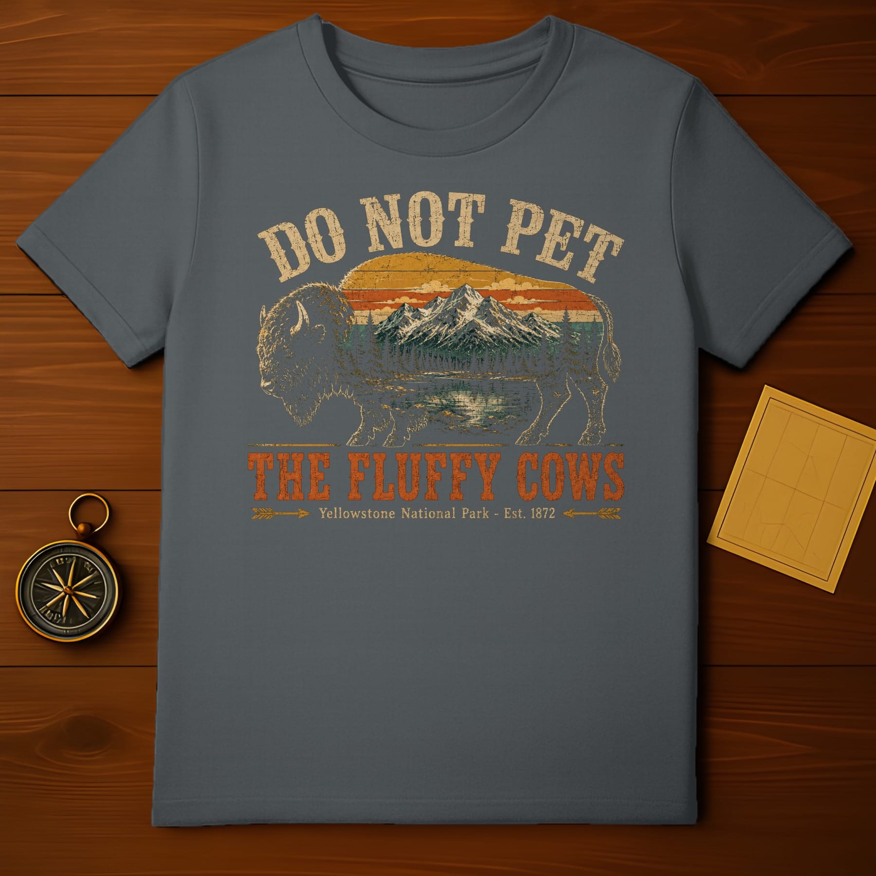 T-shirt with vintage bison, mountains, and text "Do Not Pet The Fluffy Cows".
