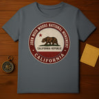 Gray t-shirt featuring a circular John Muir Woods National Monument California Republic emblem.
