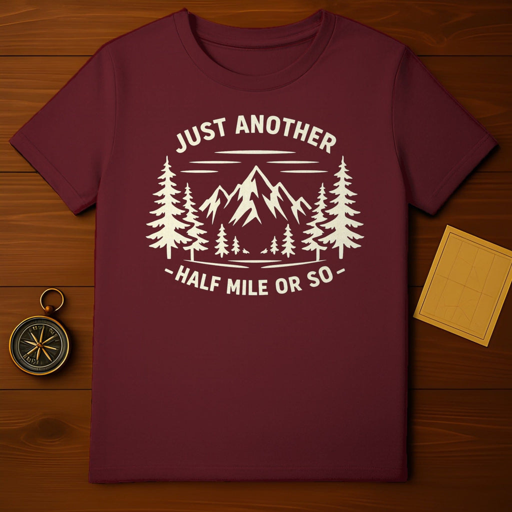 JUST ANOTHER HALF MILE OR SO Mountains Trees product type
Hiking
Adventure
Mountains
Trees
Nature
Outdoors
T-Shirt
Graphic Tee
Travel
Explore
Burgundy Shirt
Maroon Shirt
Pine Trees
Trail
Wanderlust
Forest
Camping
Scenic
Journey
Outdoorsy