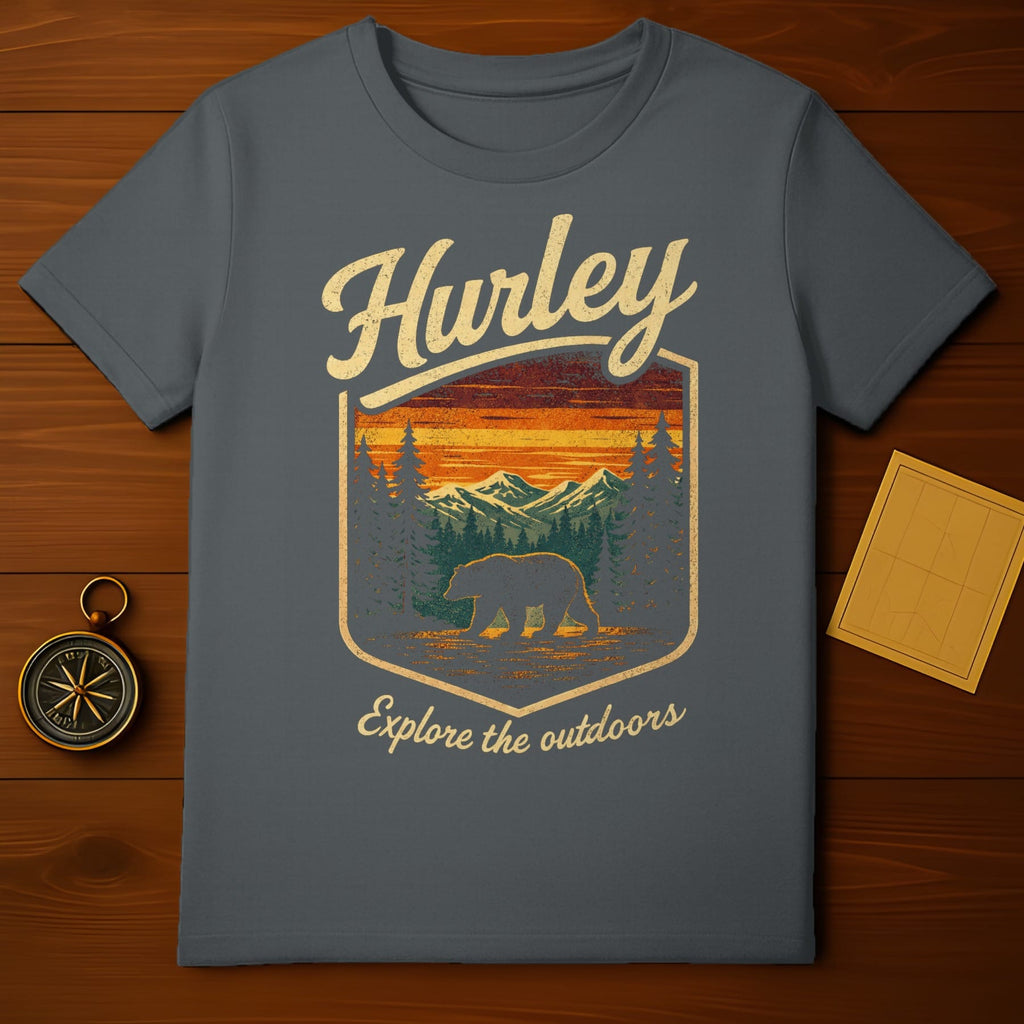 Grey Hurley t-shirt with a vintage graphic of a bear in a forest landscape.