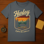 Grey Hurley t-shirt with a vintage graphic of a bear in a forest landscape.