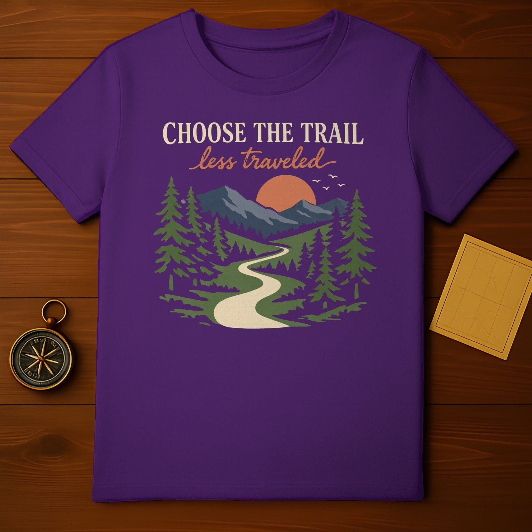 CHOOSE THE TRAIL less traveled Hiking Nature Scenic product type
trail design mountains art trees graphic sun scene birds illustration winding path nature inspired hiking adventure outdoors explore wilderness travel landscape view choose the trail less traveled graphic shirt purple apparel scenic design adventure clothing unique print outdoors lover wanderlust style