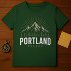 Green t-shirt with "Portland Oregon" text and mountain graphic.