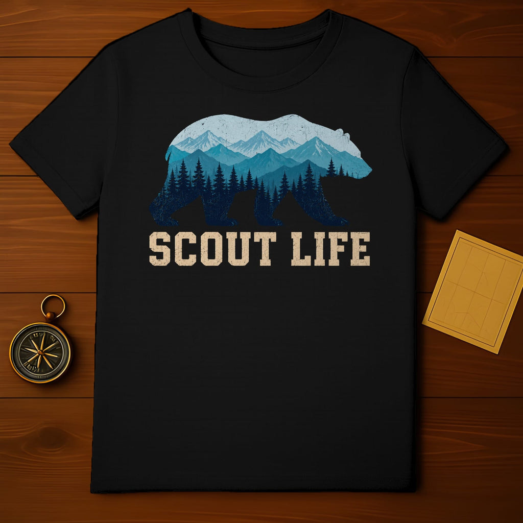 Black t-shirt with a bear silhouette filled with mountains and trees, text "SCOUT LIFE".