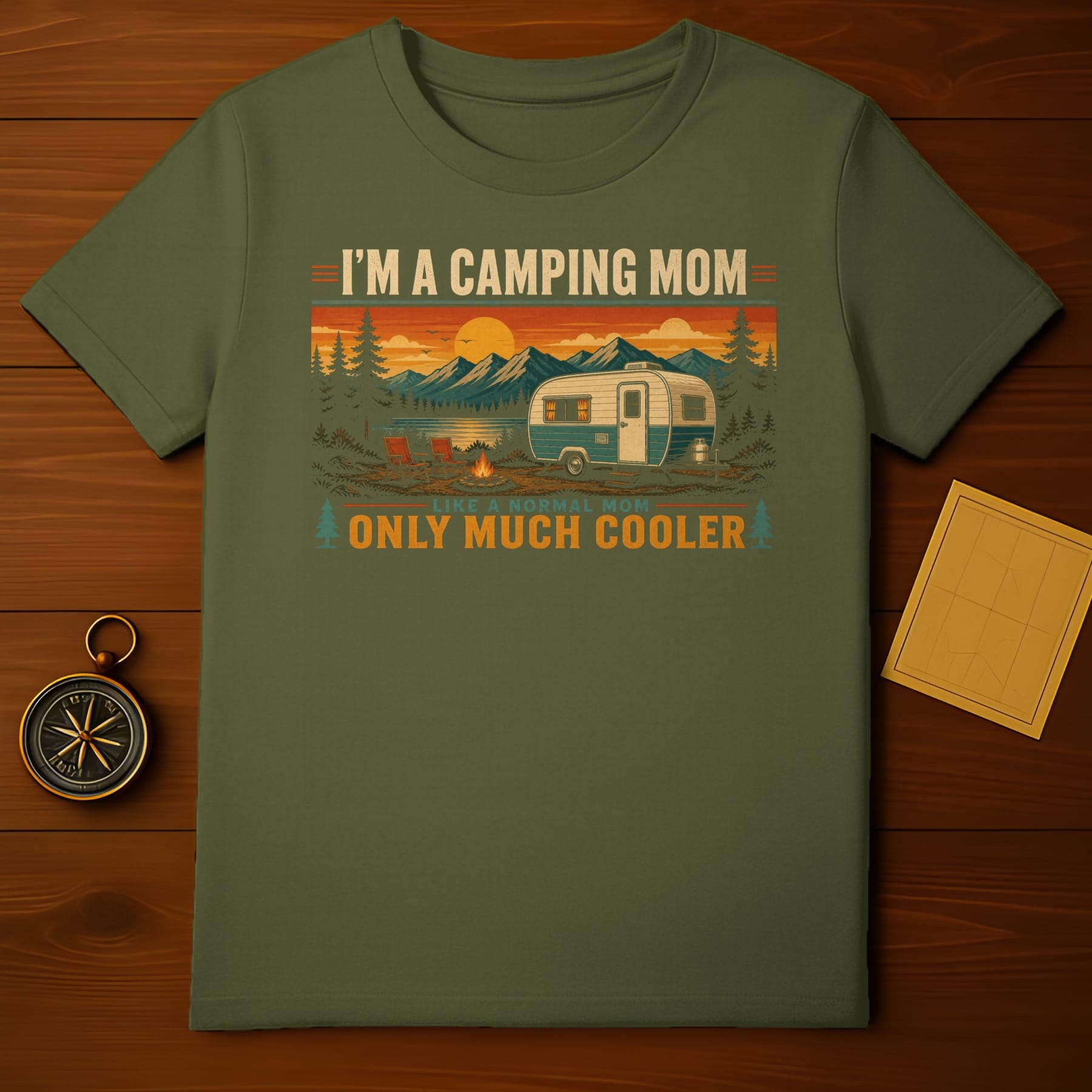 Green t-shirt with "I'm a camping mom like a normal mom only much cooler" text.
