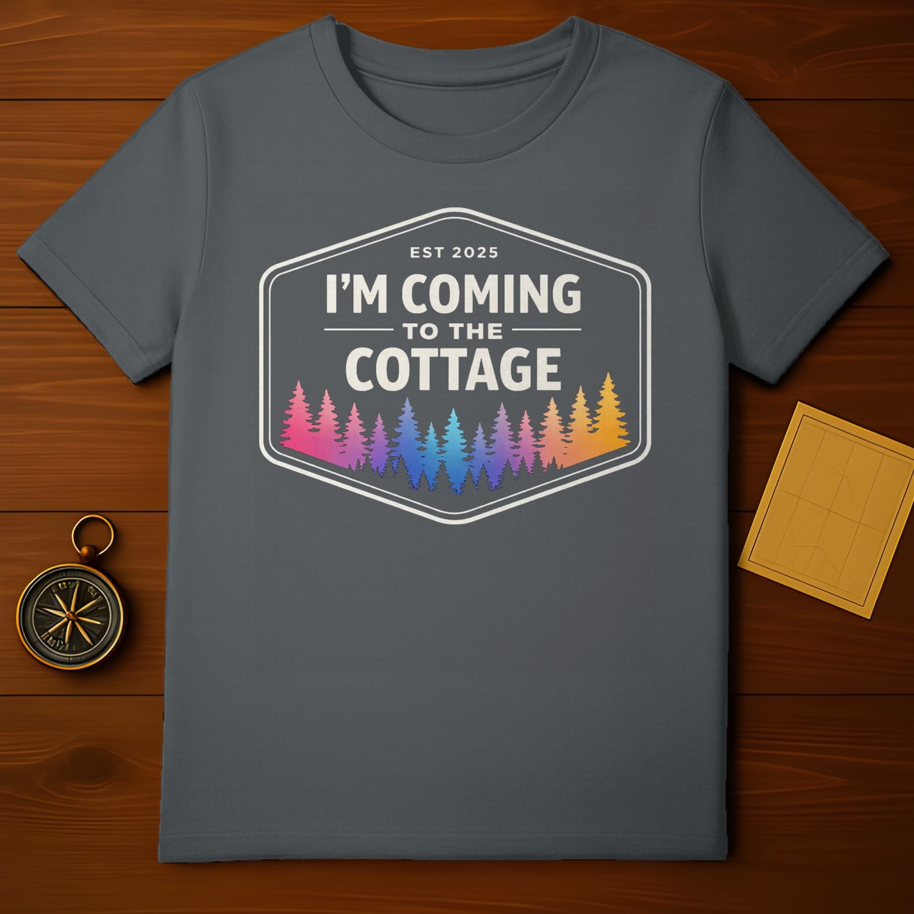 T-shirt with "I'm Coming to the Cottage" and colorful forest design.