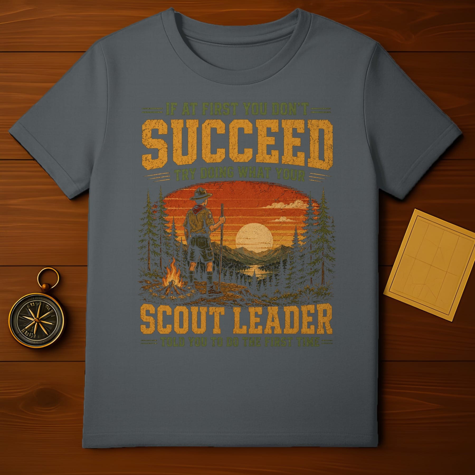 "Scout Leader" t-shirt with vintage graphic and text.