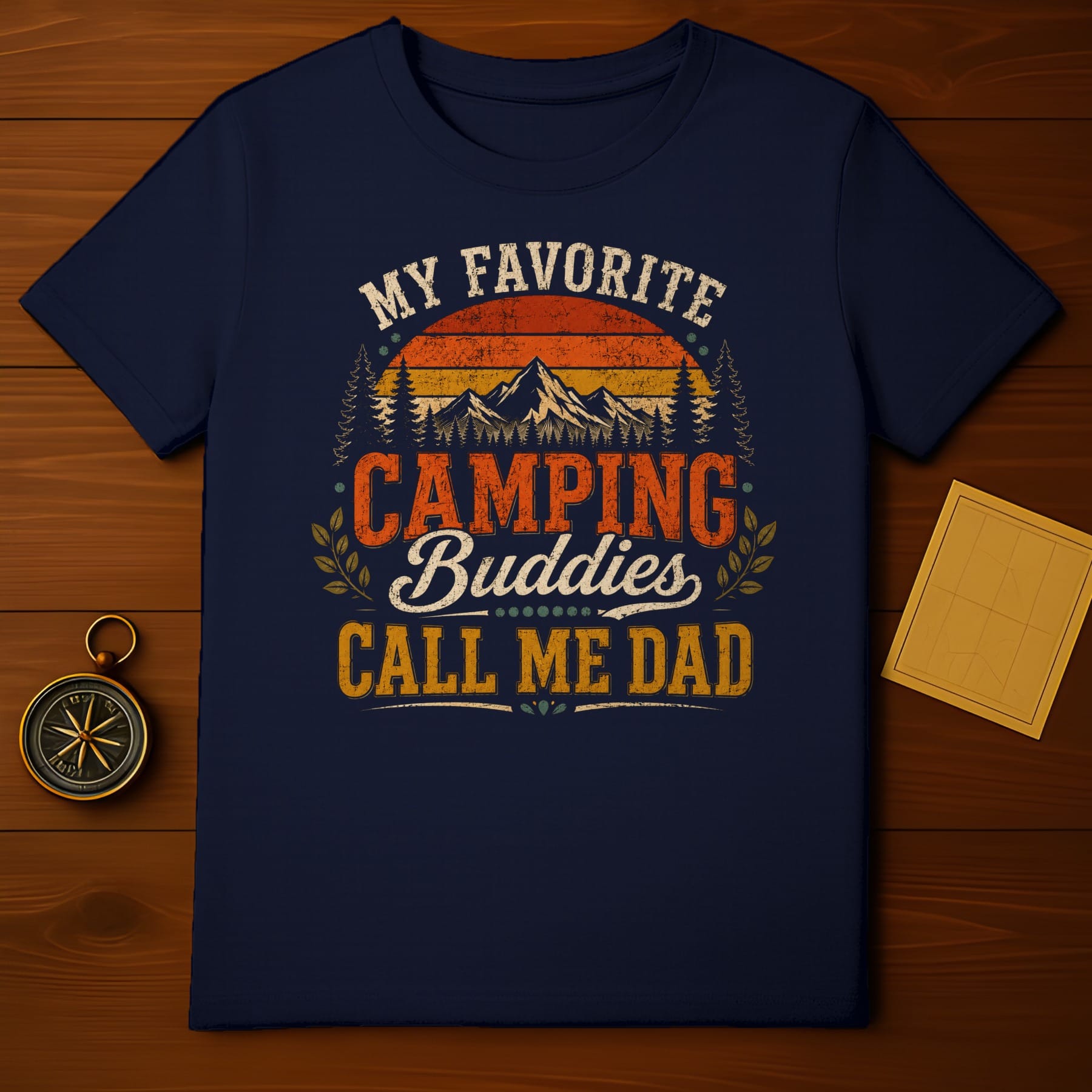 Navy t-shirt with "My favorite Camping Buddies Call Me Dad" graphic.