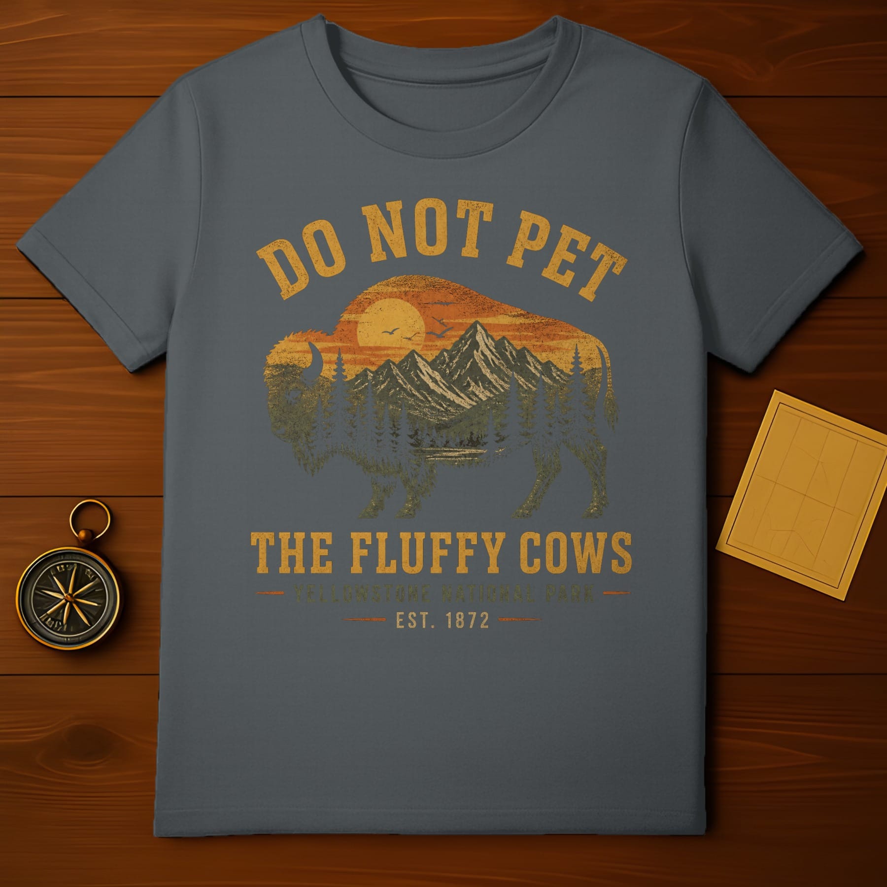 Dark gray t-shirt with a sunset scene and "Do Not Pet the Fluffy Cows" text.