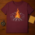 Burgundy t-shirt with campfire illustration and mountains, compass, and map accents.