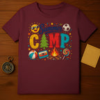 Maroon t-shirt with "Summer CAMP" graphic featuring sun, soccer ball, and campfire.