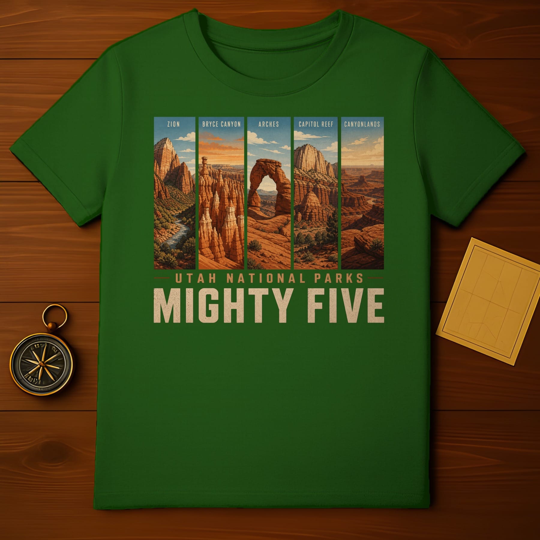 Green t-shirt featuring the Utah Mighty Five National Parks with compass and map.
