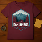 Maroon t-shirt with a geometric design featuring a cabin, trees, mountains, and "Dahlonega Georgia" text.