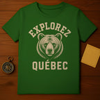Green t-shirt with bear graphic and "Explorez Québec" text.