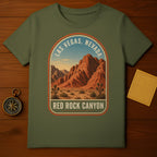 Red Rock Canyon, Nevada graphic on a green t-shirt with desert landscape.