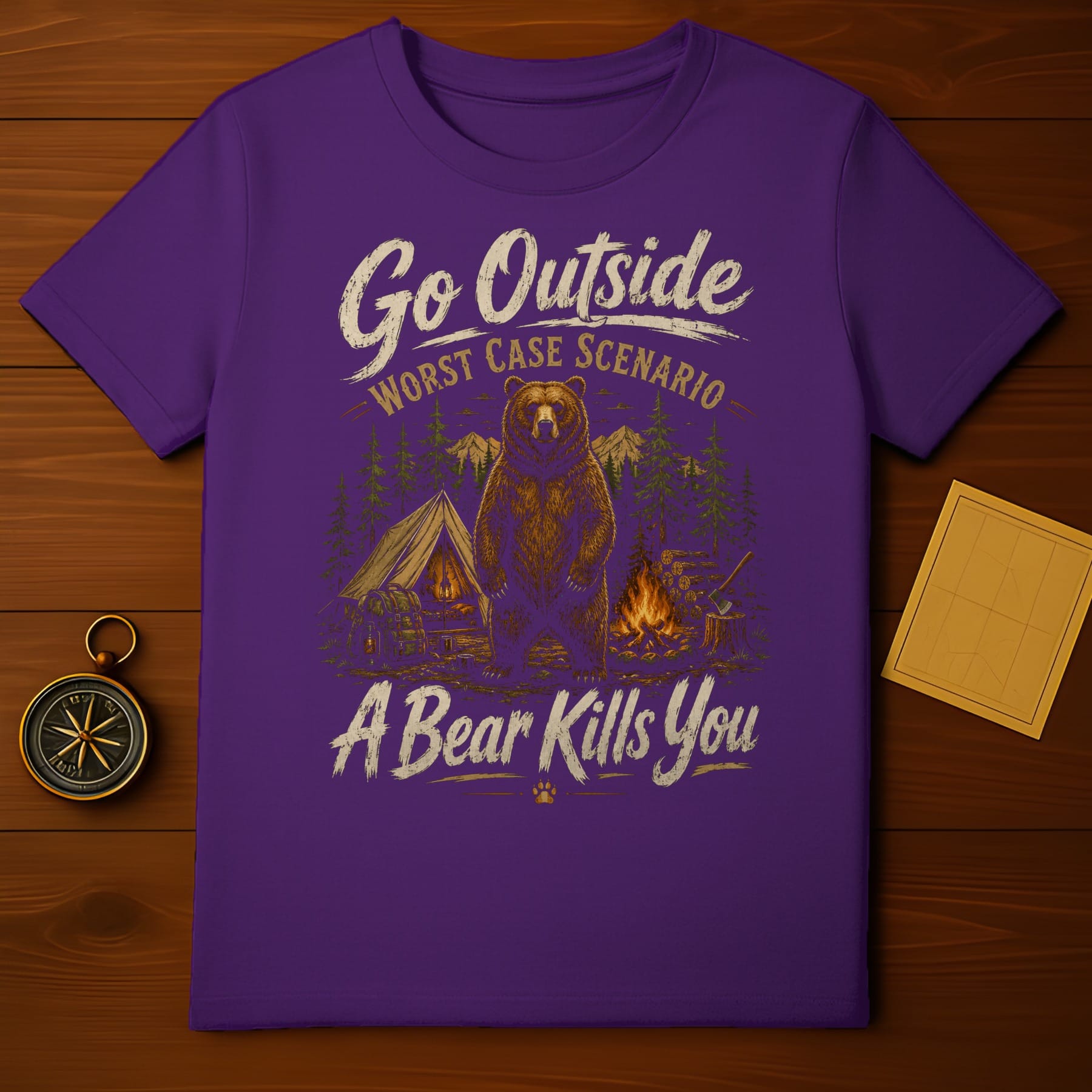 Purple t-shirt with "Go Outside Worst Case Scenario A Bear Kills You" text and bear illustration.