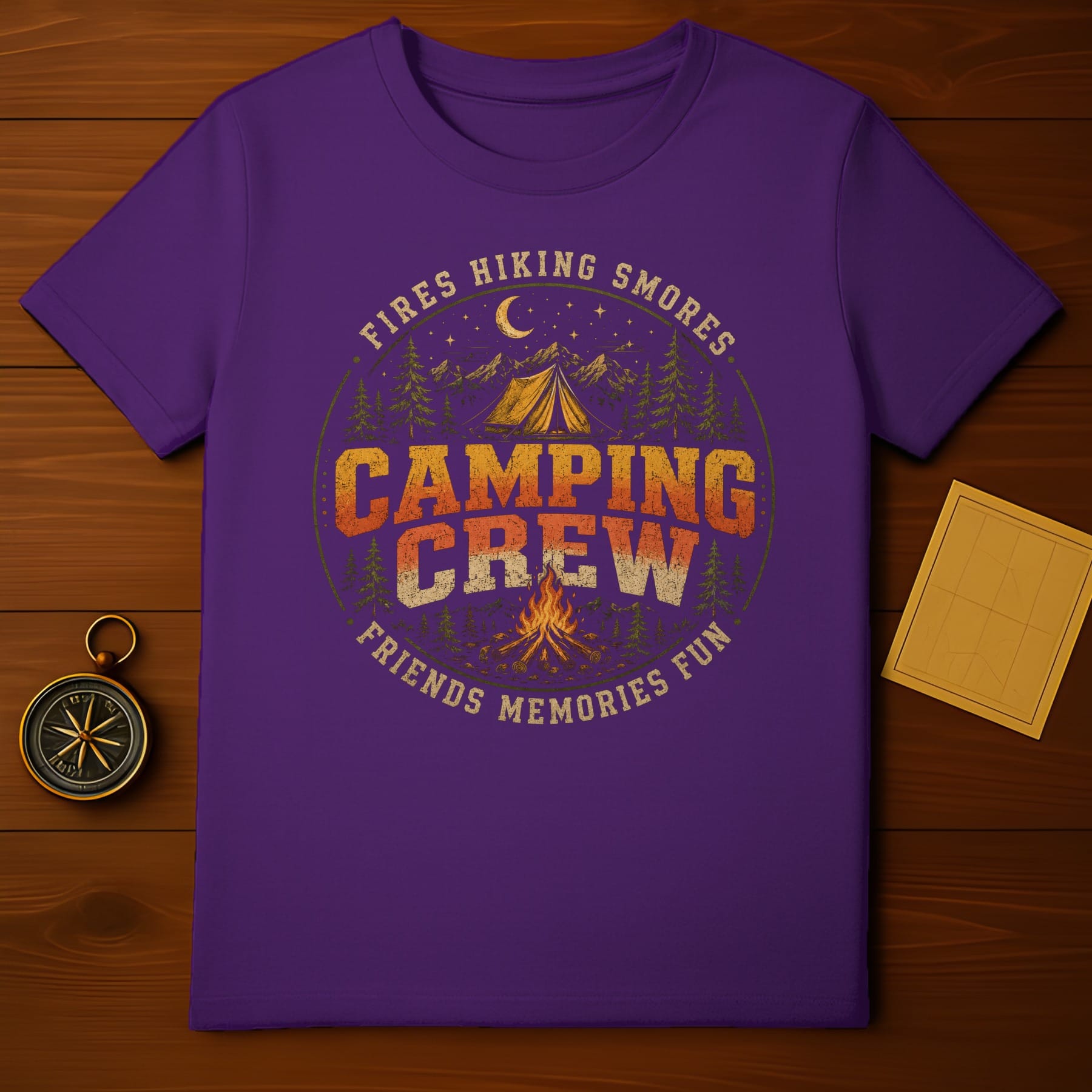Purple t-shirt with "Camping Crew" graphic, campfire, tent, trees, and mountains.