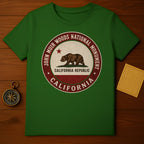 Green t-shirt with John Muir Woods National Monument California Republic emblem.
