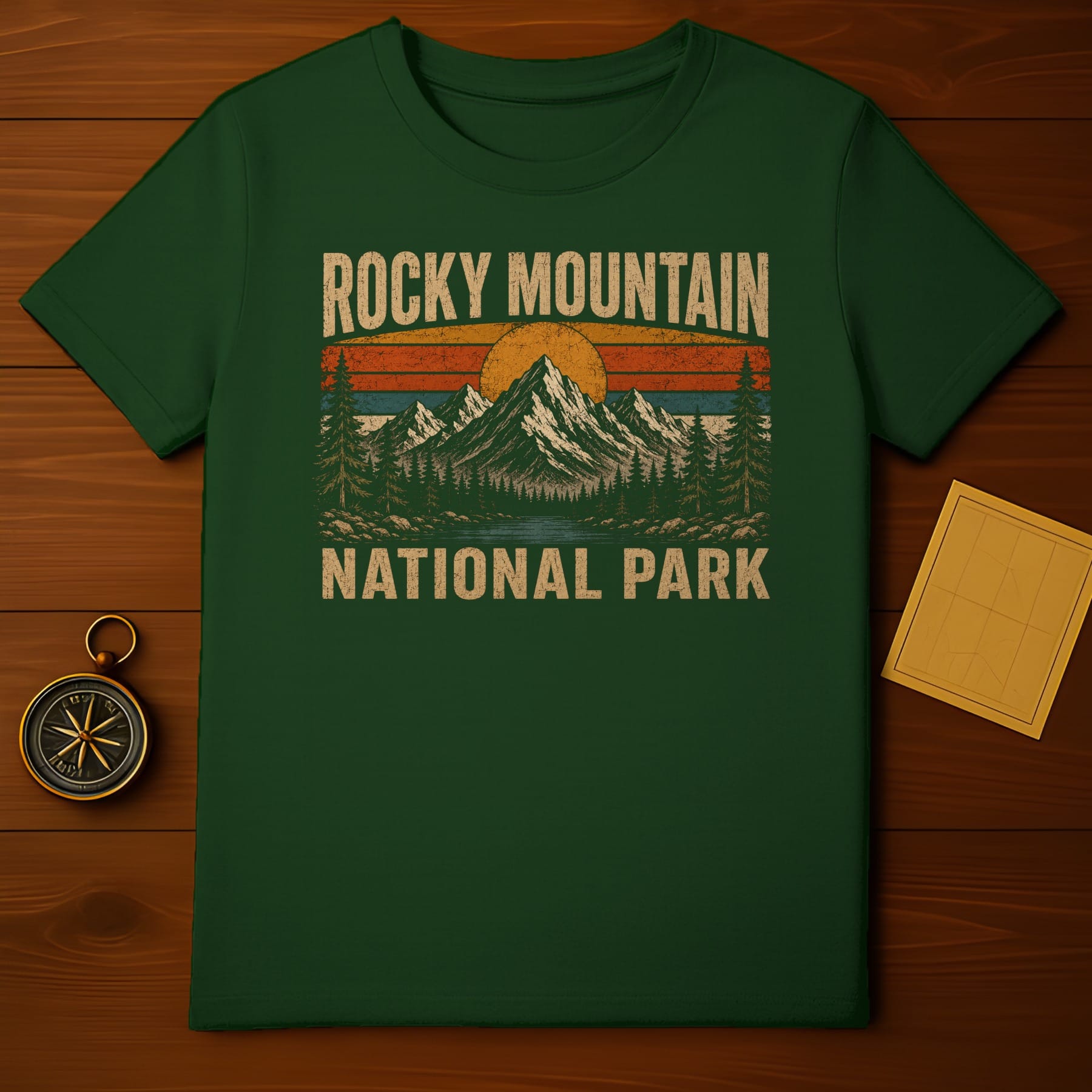 Green t-shirt with distressed "Rocky Mountain National Park" text and mountain graphic.