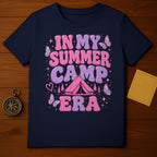 Dark navy t-shirt with "In My Summer Camp Era" text, tent, and butterflies.