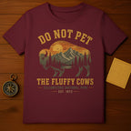 Maroon t-shirt with a bison and mountain scene, reads "Do Not Pet".