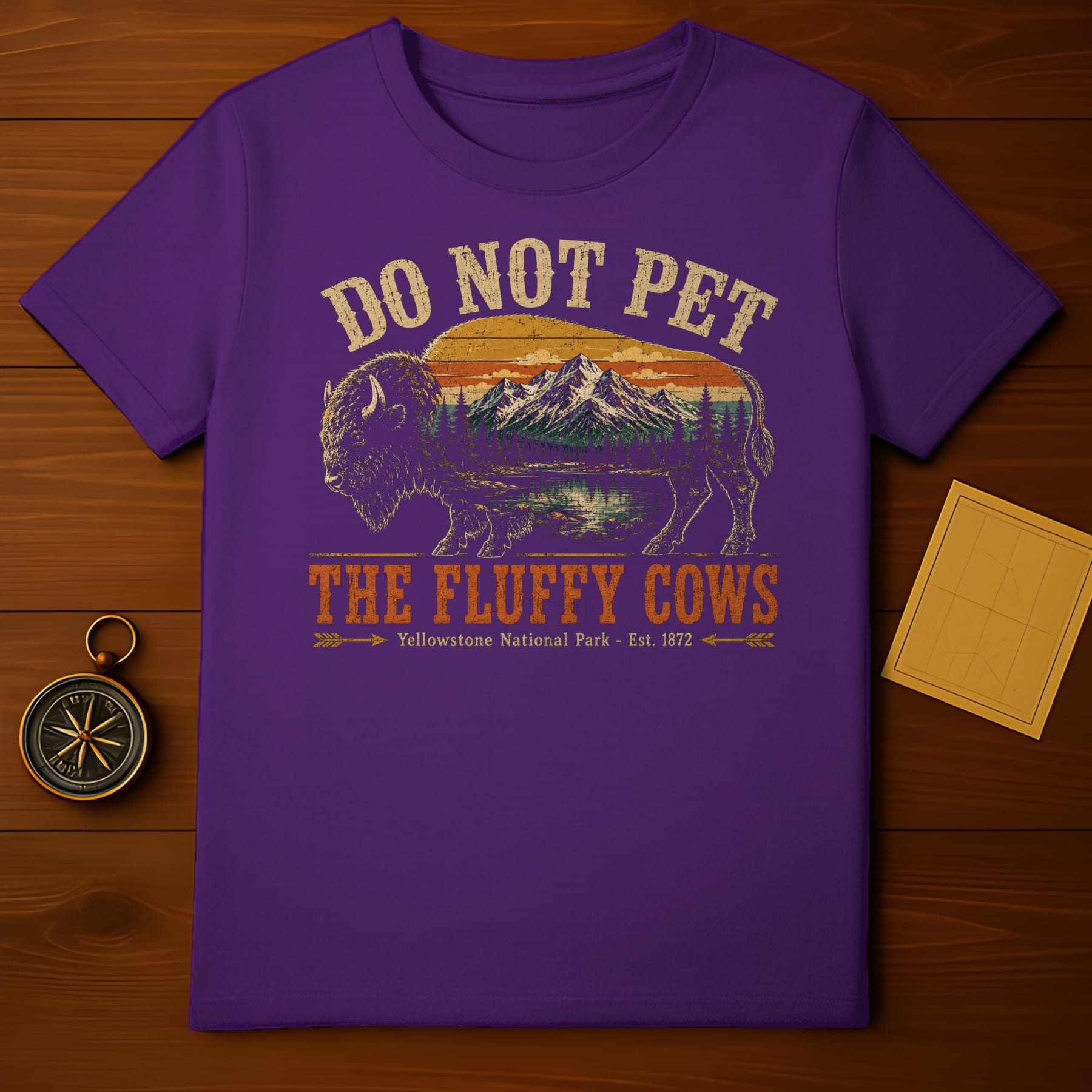 Purple t-shirt with "DO NOT PET THE FLUFFY COWS" and Yellowstone graphic.
