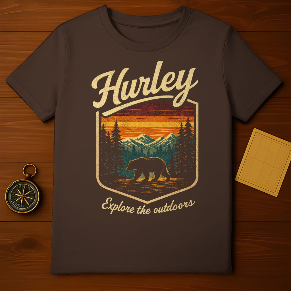 Brown Hurley t-shirt with a bear and mountain graphic and "Explore the outdoors" text.