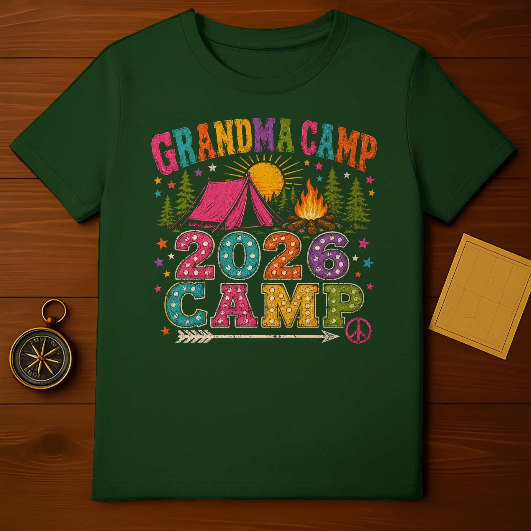 Green t-shirt with "Grandma Camp 2026 Camp" vintage graphic.