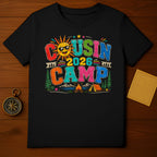 Black t-shirt with "Cousin 2026 Camp" and camping scene graphics.