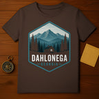 Brown t-shirt featuring a hexagonal graphic of a cabin in the mountains, labeled Dahlonega Georgia.