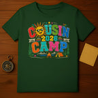 Green t-shirt with "Cousin Camp 2026" and a camping scene graphic.