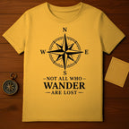 Compass Rose Not All Who Wander Are Lost Shirt
Compass rose, Wanderlust, Adventure, Travel, Explore, Inspirational quote, Navigation design, Outdoors enthusiast, Freedom spirit, Journey awaits, Discovery theme, Explorer apparel, Wanderer gift, Unique graphic, Direction symbol, Classic quote, Yellow apparel, Not all who wander, Are lost message, Map motif