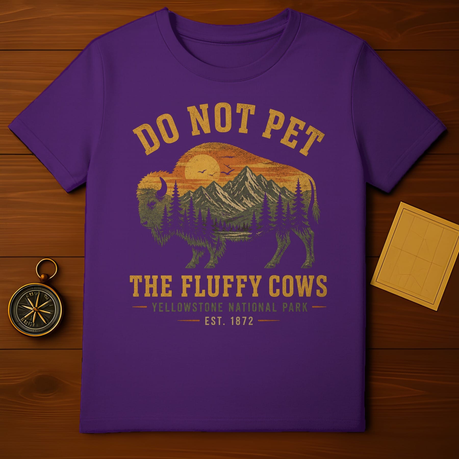 Purple t-shirt with "Do Not Pet The Fluffy Cows" Yellowstone National Park design.