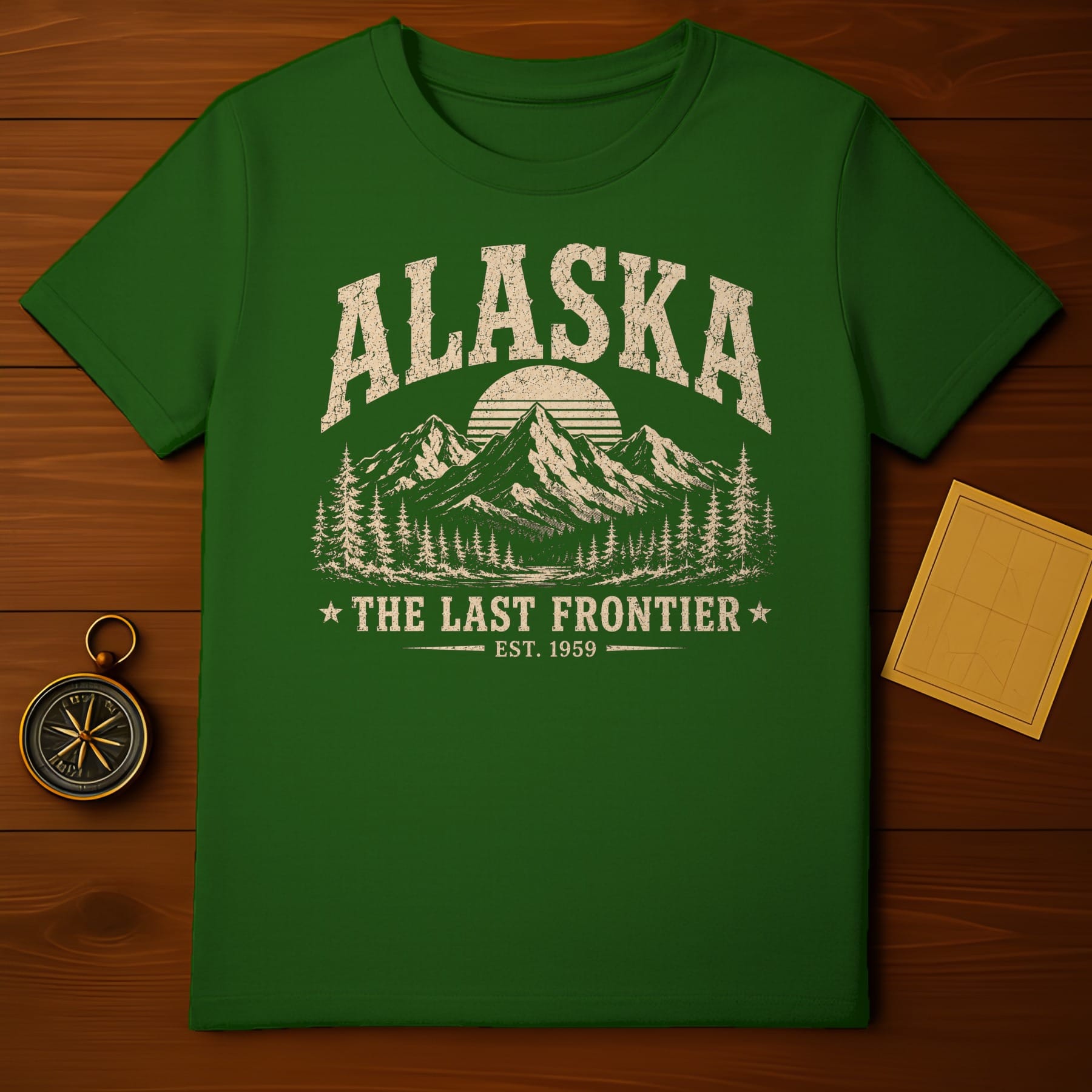 Green t-shirt with "ALASKA THE LAST FRONTIER EST. 1959" graphic.