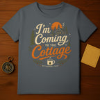 T-shirt graphic with "I'm Coming to the Cottage Retirement 2026" and a cabin scene.