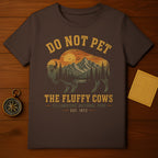 Brown t-shirt with Yellowstone National Park "The Fluffy Cows" bison design.