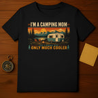 Black t-shirt with "I'm a camping mom like a normal mom only much cooler" graphic.