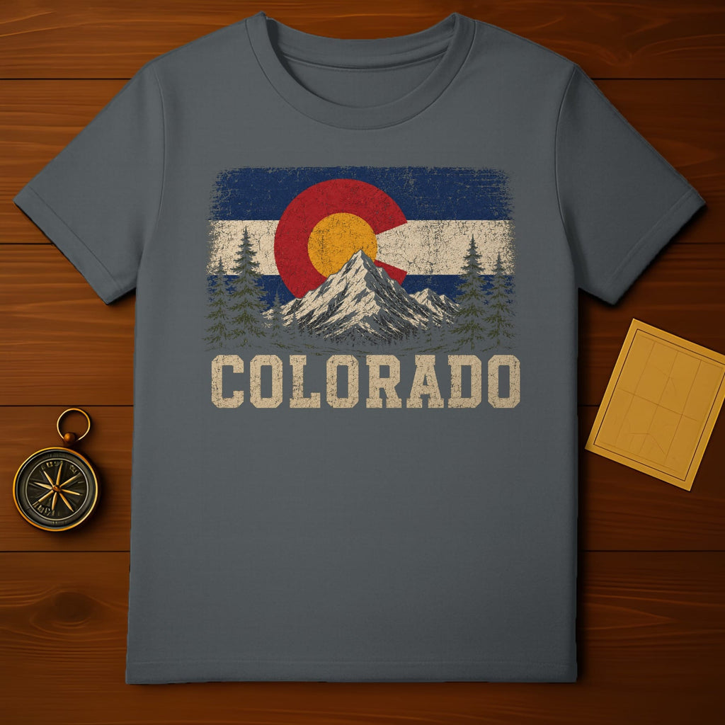 T-shirt featuring the Colorado state flag design with mountains and trees.