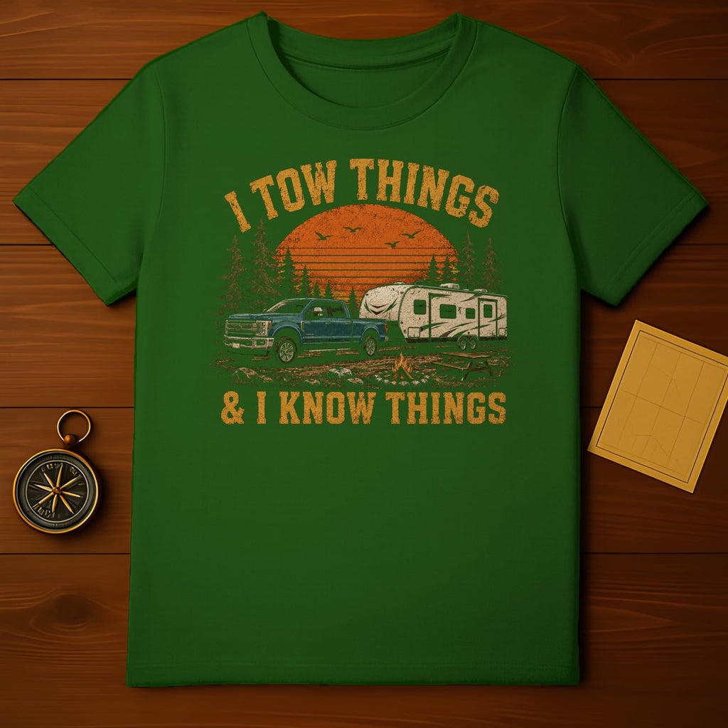 Green t-shirt with distressed graphic of a truck towing a camper with text "I TOW THINGS & I KNOW THINGS".