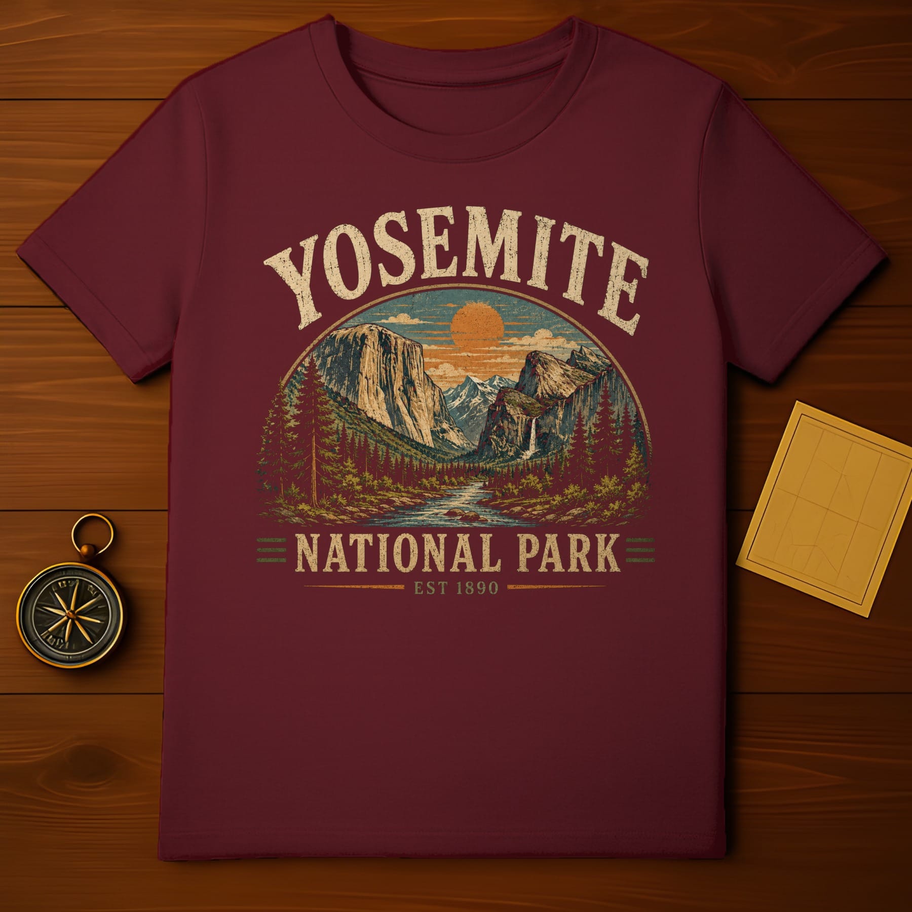 Maroon t-shirt with Yosemite National Park landscape graphic and est. 1890.