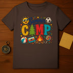 Brown t-shirt with "Summer CAMP" graphic, sun, soccer ball, campfire, and beach ball.