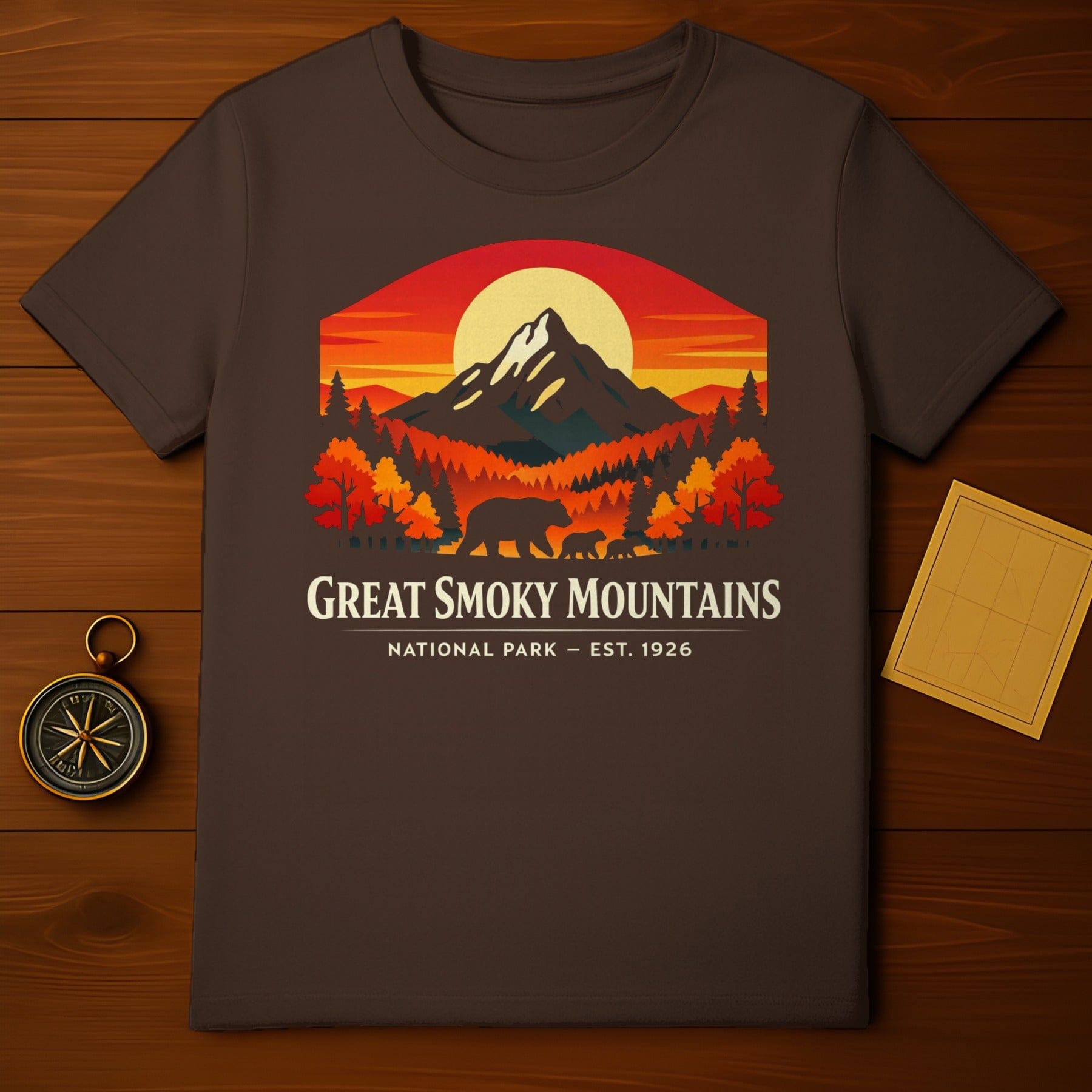 Great Smoky Mountains National Park Est. 1926 Bear product type
Great Smoky Mountains
National Park
Mountain Landscape
Bear Family
Sunset Graphic
Forest Scene
Wildlife Design
Nature Outdoors
Travel Souvenir
Vintage Style
Retro Art
Appalachian Mountains
Camping Hiking
Park Lover
Bear Cub
Est 1926
Wilderness Explore
Scenic View
Brown Shirt
Adventure Theme