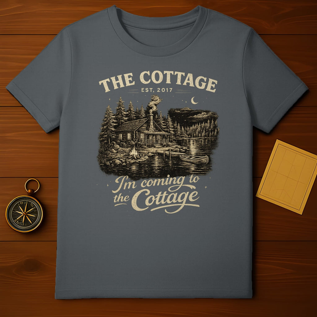 Dark t-shirt with "The Cottage Est. 2017 I'm coming to the Cottage" and a cabin scene.