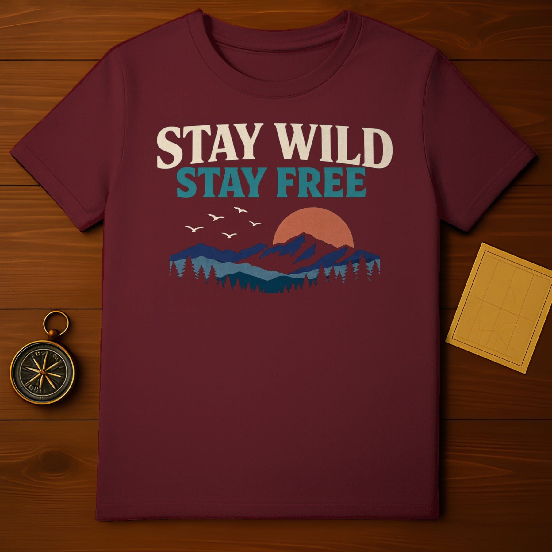 STAY WILD STAY FREE Mountains Sun Birds Nature product type
Stay Wild, Stay Free, Nature Design, Mountain Graphic, Sunset Art, Forest Trees, Flying Birds, Outdoor Theme, Adventure Tee, Explore Design, Burgundy T-shirt, Maroon Apparel, Rustic Aesthetic, Wanderlust Print, Freedom Graphic, Wild Spirit, Horizon Scene, Scenic T-shirt, Graphic Top, Casual Top