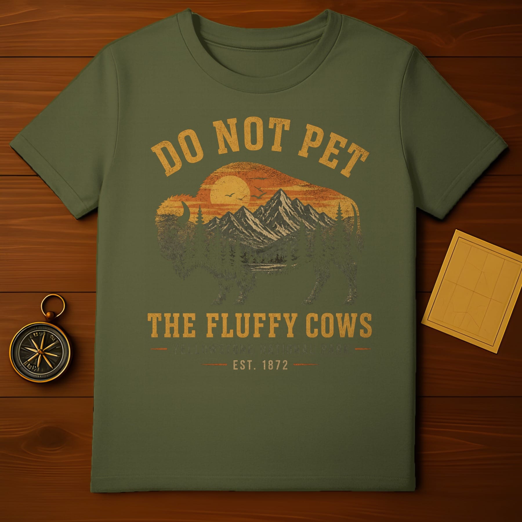 Olive green t-shirt with "DO NOT PET THE FLUFFY COWS" and bison silhouette.
