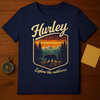 Navy t-shirt with "Hurley Explore the outdoors" and bear in forest graphic.