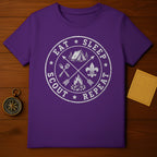 Purple t-shirt with white circle graphic: "Eat Sleep Scout Repeat" and camping icons.